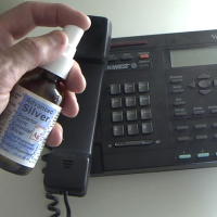 Spray Colloidal Silver on Office Telephone
